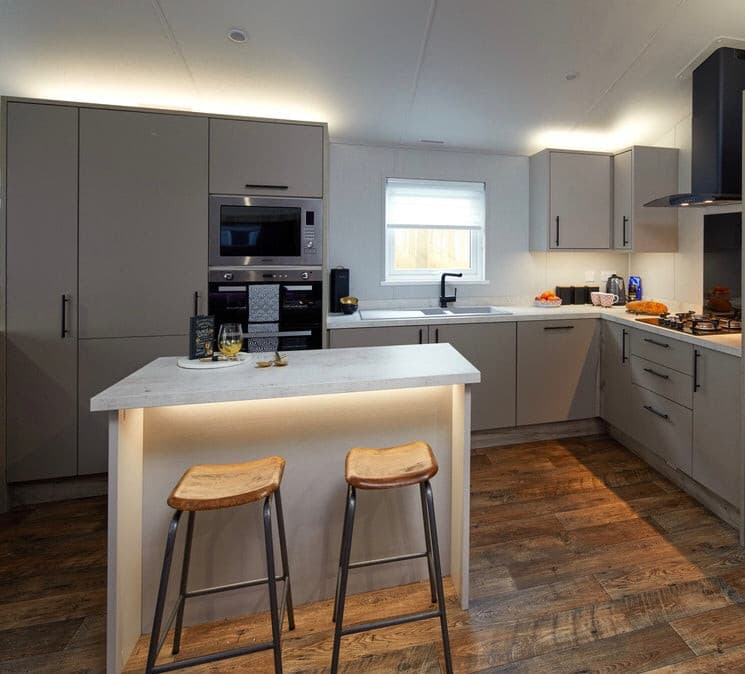 Breakfast bar in the modern equipped kitchen 