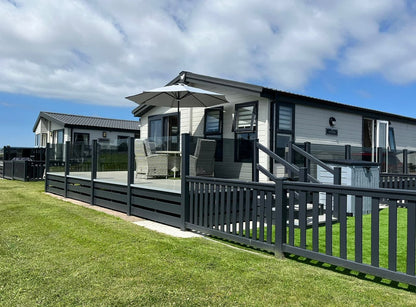 Outdoor decking area with table and chairs 